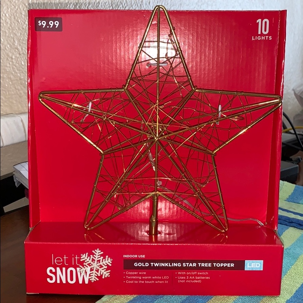 Gold twinkling star tree topper